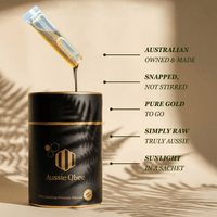 The Morning Ritual Pair | Aussie Qbee 100% Australian Premium Manuka honey in a stylish black container with a sachet being lifted.